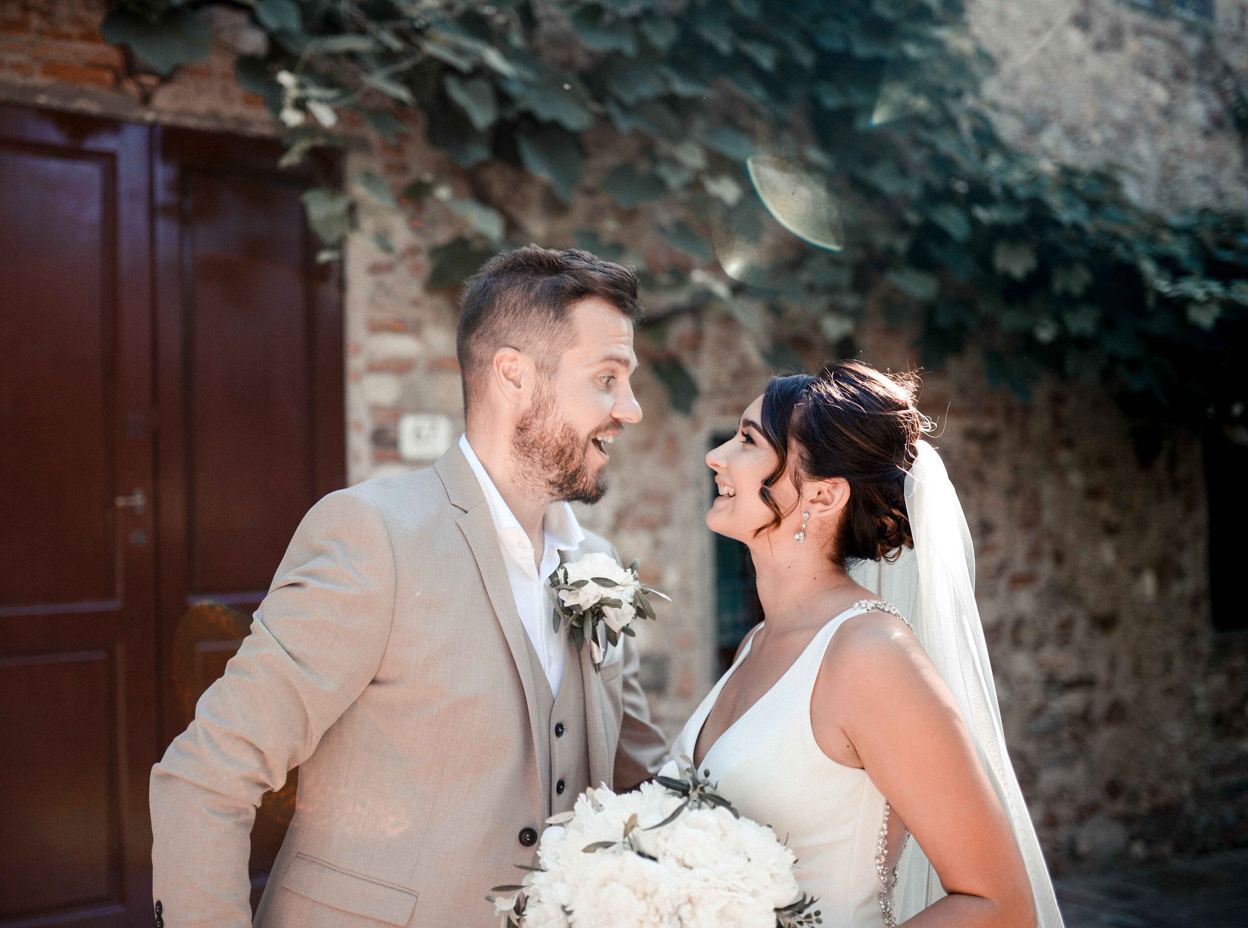 Fun, romantic photograph of a Yorkshire bride and groom after being married in the Italian countryside.